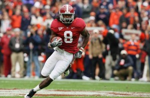 Nov 26, 2010; Tuscaloosa, AL, USA; Alabama Crimson Tide wide receiver Julio Jones (8) carries the ball against the Auburn Tigers at Bryant-Denny Stadium. Mandatory Credit: Marvin Gentry-USA TODAY Sports