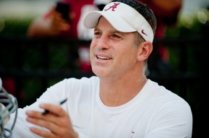 Aug 4, 2013; Tuscaloosa, AL, USA; Alabama Crimson Tide defensive coordinator Doug Nussmeier signs autographs following practice at Bryant Denny Stadium. Mandatory Credit: Kevin Liles-USA TODAY Sports