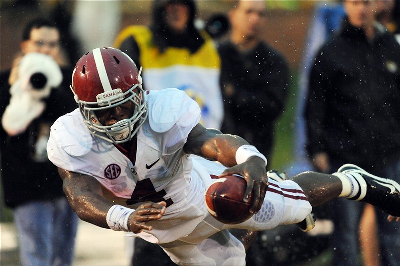 Oct 13, 2012; Columbia, MO, USA; Alabama Crimson Tide running back T.J. Yeldon (4) runs in for a touchdown in the second quarter of the game against the Missouri Tigers at Farout Field. Mandatory Credit: Denny Medley-US PRESSWIRE