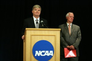July 23, 2012; Indianapolis, IN, USA; NCAA president Mark Emmert speaks during a press conference at the NCAA Headquarters with NCAA Executive Committee chair Ed Ray standing behind him to announce corrective and punitive measures against Penn State University for the child abuse committed by former Penn State Nittany Lions assistant coach Jerry Sandusky. Mandatory Credit: Brian Spurlock-USA TODAY Sports