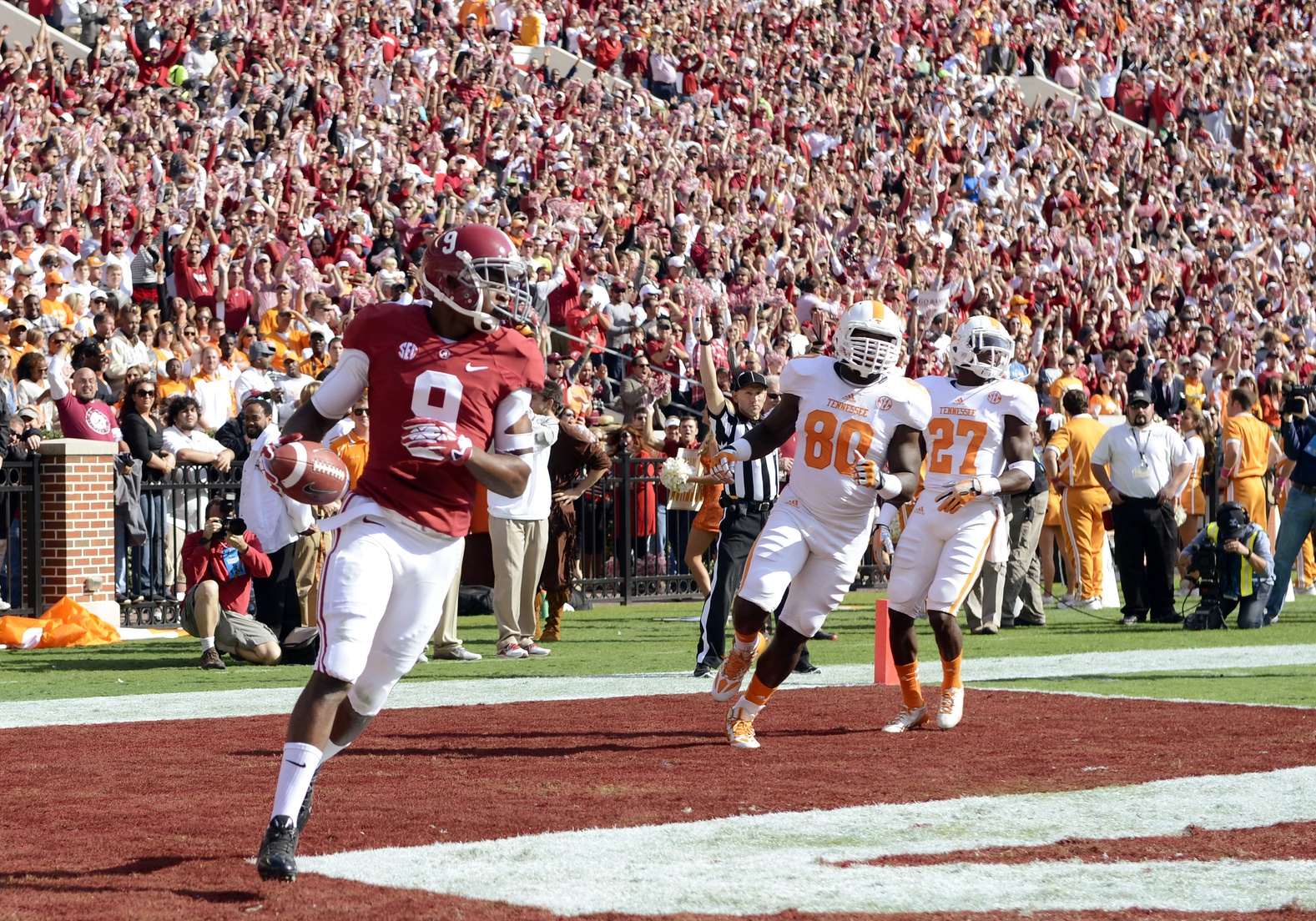 Oct 26, 2013; Tuscaloosa, AL, USA; Alabama Crimson Tide wide receiver Amari Cooper (9) enters the end zone on his 54-yard touchdown against the Tennessee Volunteers during the first quarter at Bryant-Denny Stadium. Mandatory Credit: John David Mercer-USA TODAY Sports