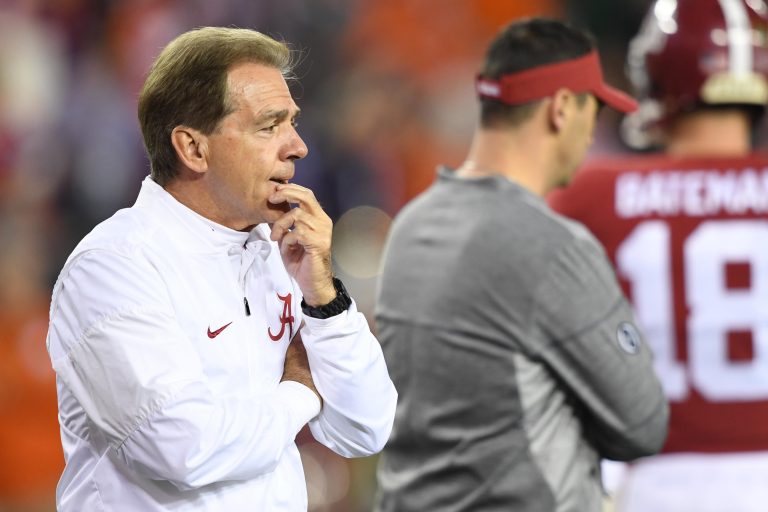 Jan 9, 2017; Tampa, FL, USA; Alabama Crimson Tide head coach Nick Saban looks on as offensive coordinator Steve Sarkisian stands in the background during warm ups prior to the game against the Clemson Tigers in the 2017 College Football Playoff National Championship Game at Raymond James Stadium. Mandatory Credit: John David Mercer-USA TODAY Sports