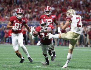 Sep 2, 2017; Atlanta, GA, USA; Alabama Crimson Tide running back Damien Harris (34) blocks the punt by Florida State Seminoles place kicker Logan Tyler (21) in the third quarter at Mercedes-Benz Stadium. Mandatory Credit: Jason Getz-USA TODAY Sports