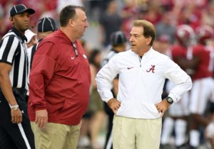 Oct 14, 2017; Tuscaloosa, AL, USA; Arkansas Razorbacks head coach Bret Bielema and Alabama Crimson Tide head coach Nick Saban meet midfield prior to the start of their game at Bryant-Denny Stadium. Mandatory Credit: John David Mercer-USA TODAY Sports
