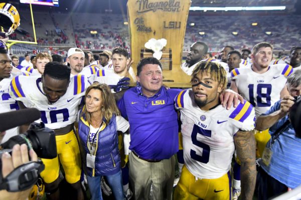 Oct 21, 2017; Oxford, MS, USA; LSU Tigers head coach Ed Orgeron celebrates with his players after a game against the Mississippi Rebels at Vaught-Hemingway Stadium. Mandatory Credit: Matt Bush-USA TODAY Sports
